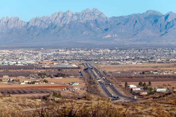 Las Cruces, New Mexico view of city View from high vantage point, mountains in background, cityscape, bright sunny day, blue sky, interstate 10, city in distance, high angle view new mexico stock pictures, royalty-free photos & images