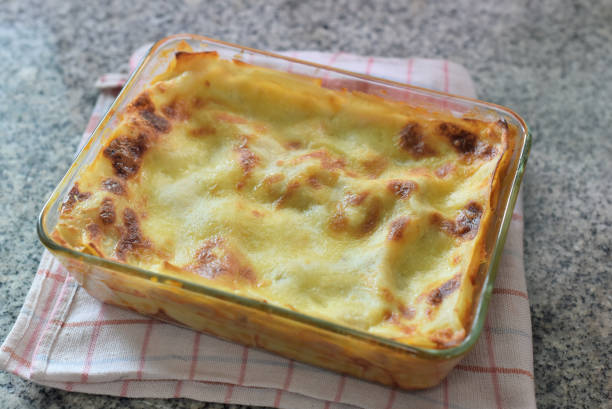 Lasagna in glass bowl, Italian cuisine stock photo