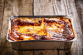 Lasagna on wooden background
