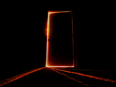 Light creeping out from behind a door.