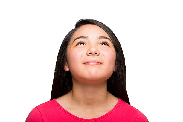 Latin American girl thinking Latin American girl thinking isolated over white background mexican teenage girls stock pictures, royalty-free photos & images