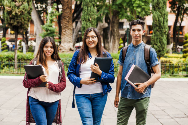 latin students or hispanic group of friends in Mexico, Mexican young people. stock photo