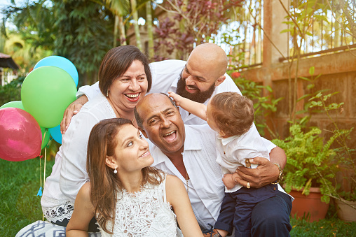 Latino Family Have Fun On Garden Foto de stock y más banco de ...