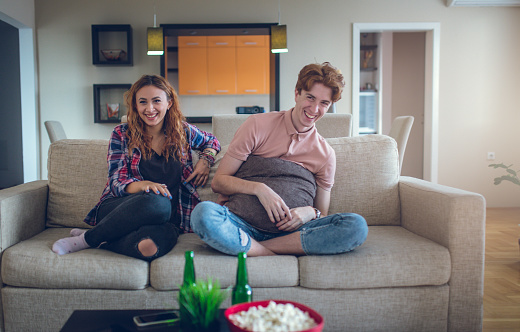 Laughing At A Funny Scene In An Old Movie Stock Photo