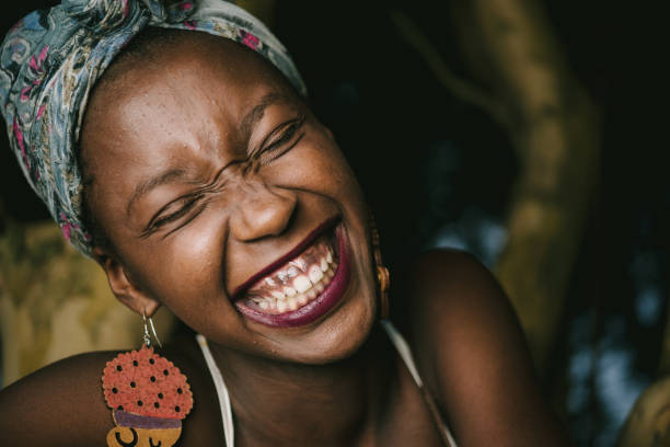 Laughing is the best of life Portrait of a Beautiful afro-american young woman nigeria stock pictures, royalty-free photos & images