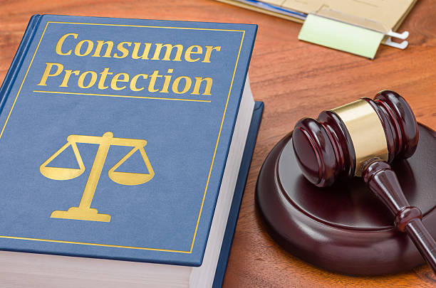 Law book with a gavel - Consumer Protection stock photo