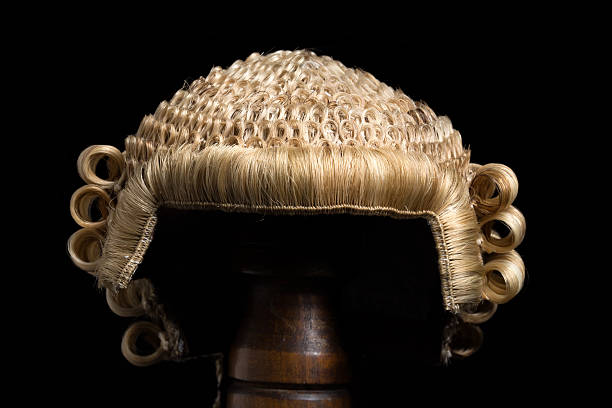 Lawyer's wig front Front view of an antique horsehair lawyer's wig wig stock pictures, royalty-free photos & images