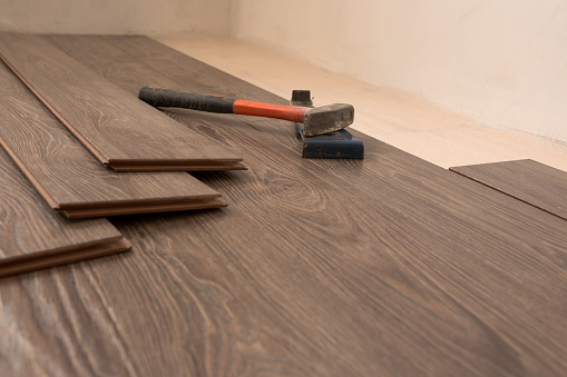 Laying A Laminate Under The Color Of A Tree On The Floor Lie Tools