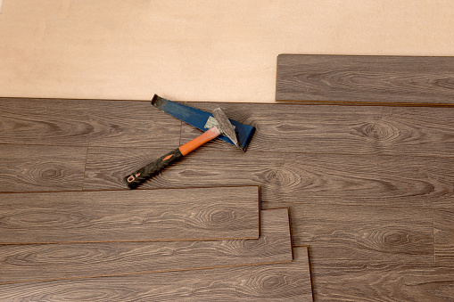 Laying A Laminate Under The Color Of A Tree On The Floor Lie Tools