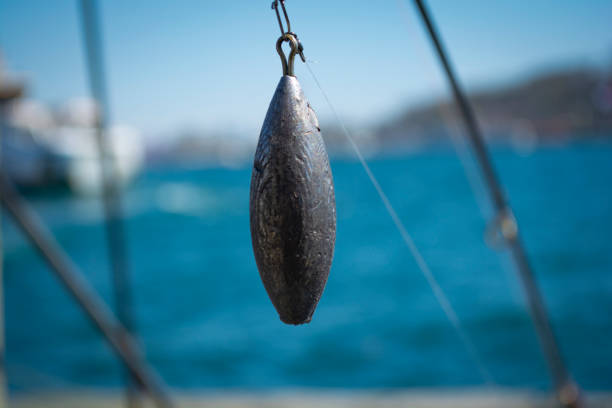 Lead weight or sinker used for fishing stock photo