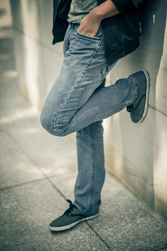 Leaning On The Wall Stock Photo - Download Image Now - iStock