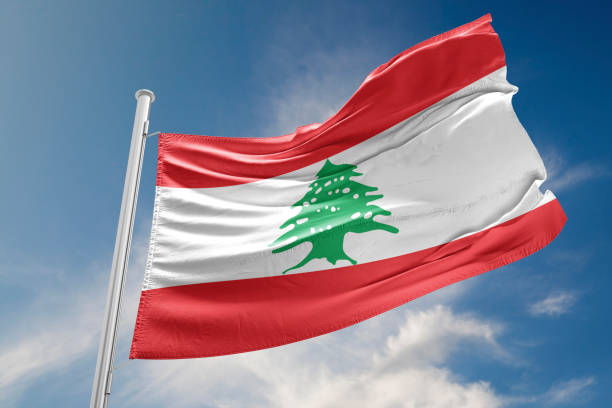 Lebanon Flag is Waving Against Blue Sky Lebanon flag is waving at a beautiful and peaceful sky in day time while sun is shining. 3D Rendering Lebanon Flag stock pictures, royalty-free photos & images