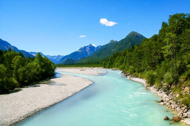 Lechriver in summer, near Forchach, Lechtaler Alps, Tyrol, Austria Lechriver with view of the Lechtaler Alps, Tyrol, Austria lech valley stock pictures, royalty-free photos & images