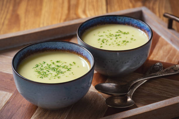 Leek and potato cream soup with cheese. stock photo