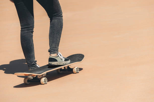 Legs of a girl on a skate - Stock photo stock photo