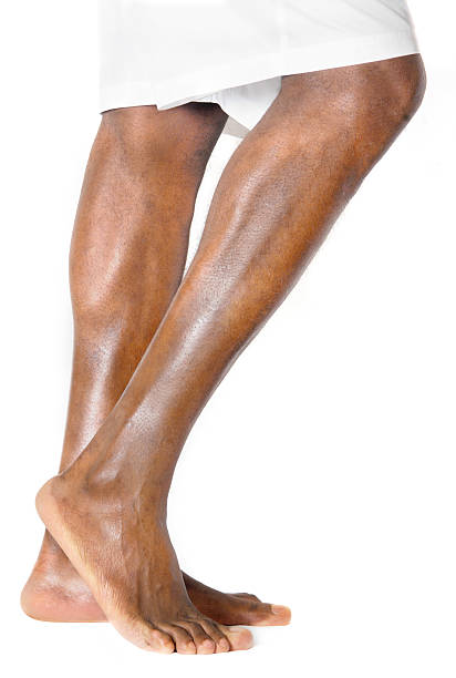 Legs Legs of the black man man pedicure stock pictures, royalty-free photos & images