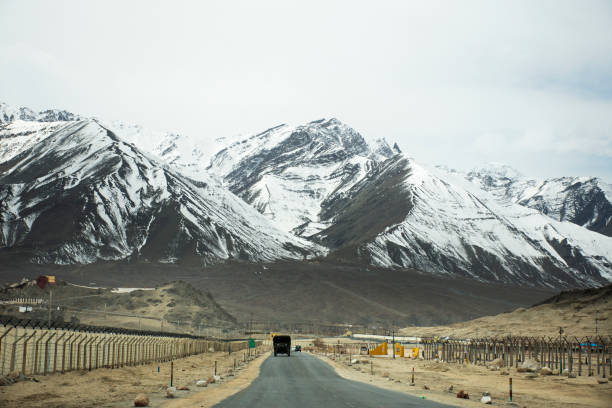 Leh Ladakh in Jammu and Kashmir, India JAMMU KASHMIR, INDIA - MARCH 20 : View landscape beside road with Indian people drive car on Srinagar Leh Ladakh highway go to Confluence River at winter on March 21, 2019 in Jammu and Kashmir, India srinagar stock pictures, royalty-free photos & images