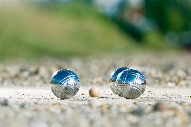 Leisure; Petanque balls close to the goal Close to the ground macro scene. cue ball stock pictures, royalty-free photos & images