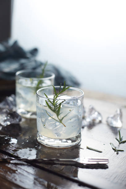 lemonade in glass with rosemary.  vodka soda stock pictures, royalty-free photos & images