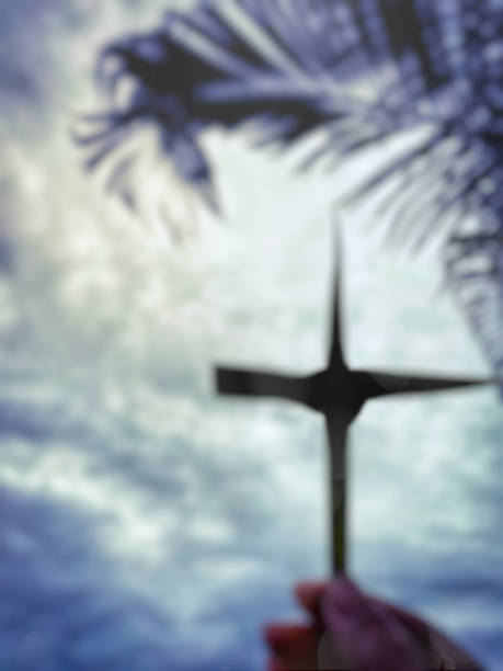 Lent Season,Holy Week and Good Friday Concepts Lent Season,Holy Week and Good Friday Concepts - blurry image of cross in bokeh with sky background. Stock photo. good friday stock pictures, royalty-free photos & images