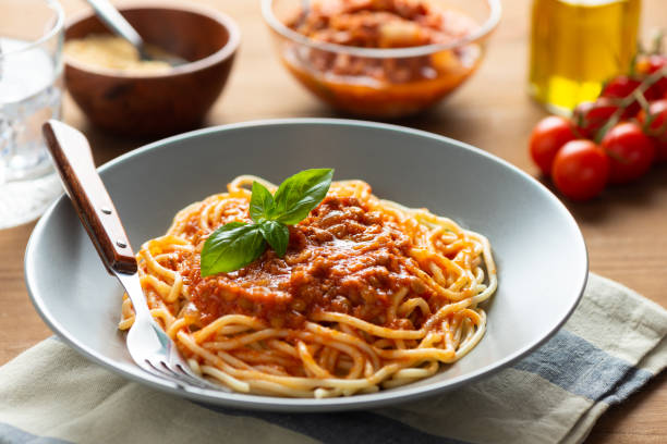Lentil bolognese pasta. Vegan food stock photo