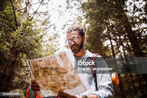 istock Let's check the map for my direction! 1330007081