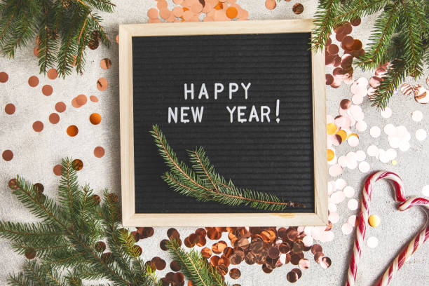 Letter board new year 2022 and christmas concept. Top horizontal view copyspace christmas decorations, fur tree stock photo