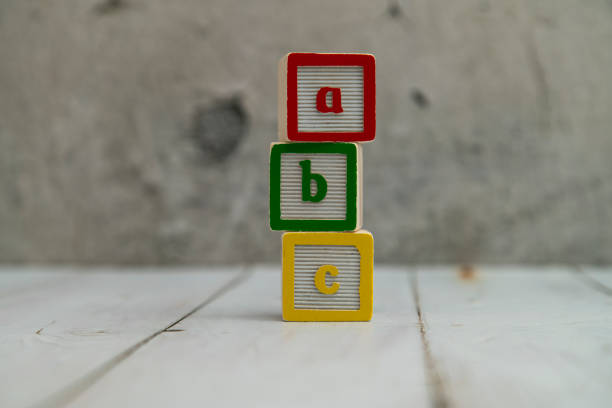 ABC letters alphabet on wooden cube blocks stock photo