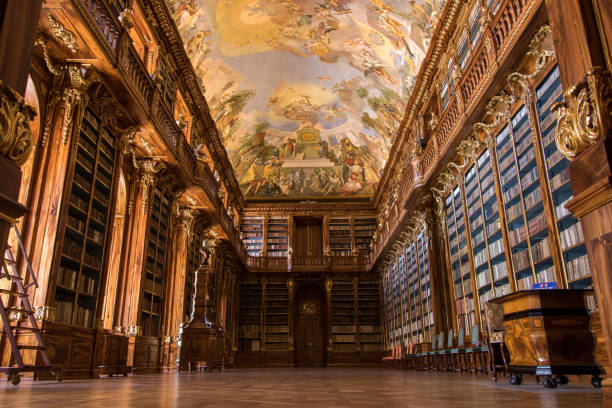 Library of Strahov Monastery (Philosophical Hall) in Prague, Czech Republic Philosophical Hall is one part of this impressive library with outstanding paintings on its ceiling prague art stock pictures, royalty-free photos & images