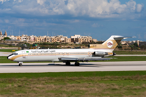 Luqa, Malta - November 10, 2004: Libyan Arab Airlines Boeing 727-2L5/Adv landing runway 32, arriving from Tripoli.