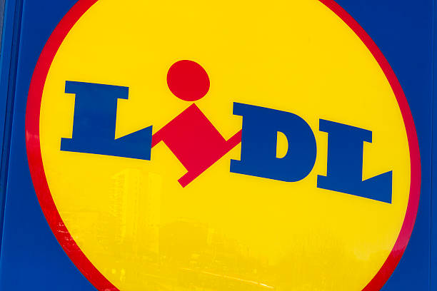 Lidl logo "Solna, Sweden - March 23, 2012: Sign of a Lidl store. Lidl is a discount supermarket chain based in Germany that operates over 10 000 stores across Europe." lidl stock pictures, royalty-free photos & images