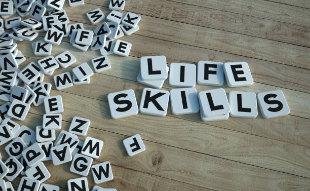 Life skills written in letter tiles wood stock photo
