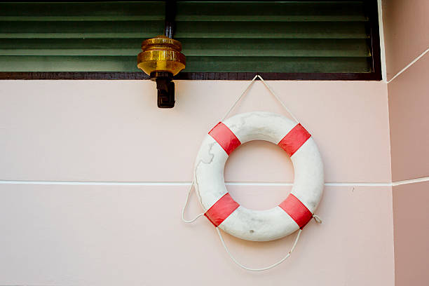 life vest on white wall.