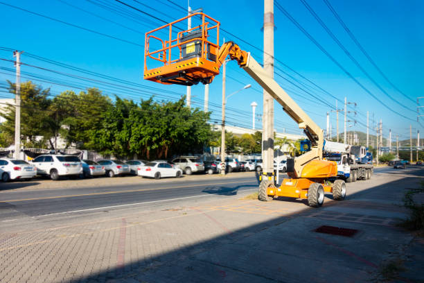 Lifting boom lift in construction site. stock photo