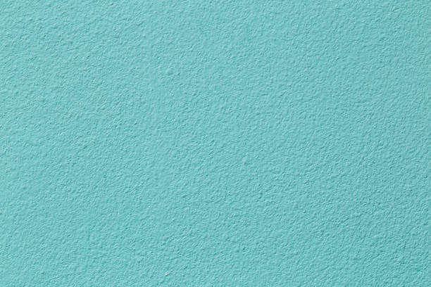 Light blue color with an old grunge wall concrete texture as a background. stock photo