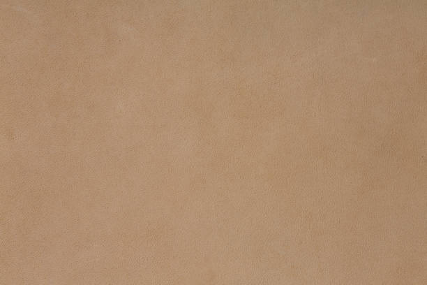 Light brown leather texture on macro Light brown leather texture on macro. High resolution photo. knobby knees stock pictures, royalty-free photos & images