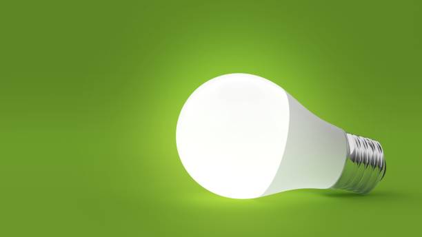 Light bulb isolated on green background. 3d illustration LED light bulb isolated on green background. Light on. 3d illustration. led light stock pictures, royalty-free photos & images