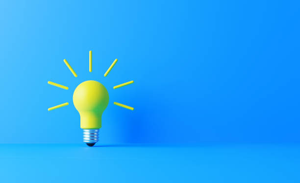 Light bulb on blue background. Horizontal composition with copy space. Creativity and innovation concept.