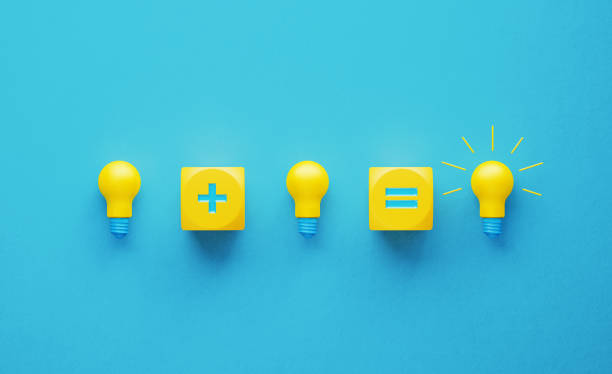 Light Bulbs and Yellow Cubes with Plus and Equal Signs Light bulbs and yellow cubes with plus and equal signs on turquoise background. Innovation and teamwork concept. Horizontal composition with copy space. equal sign stock pictures, royalty-free photos & images