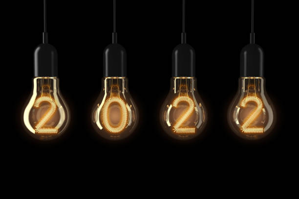 Light Bulbs Illuminated 2022 New Year. 3d Rendering stock photo