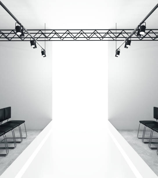 Light empty fashion runway Light empty fashion runway podium stage interior with seats, lights and copyspace. 3D Rendering fashion runway stock pictures, royalty-free photos & images