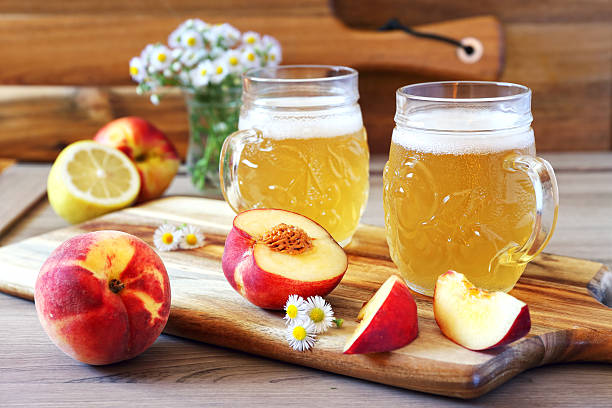 Light fruit beer and fruits stock photo