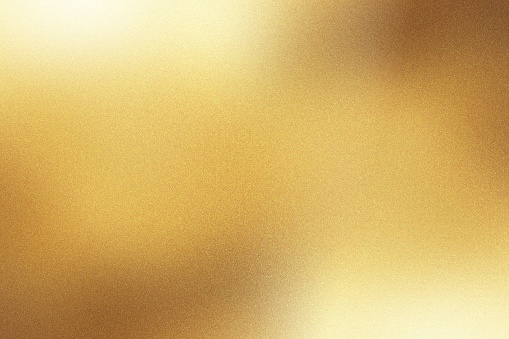 Light shining down on gold foil metal wall with copy space, abstract background