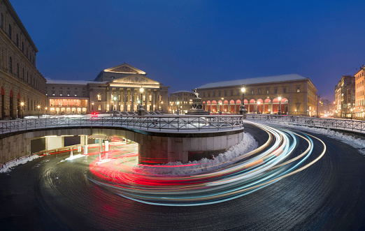 Light trails in front of Munich National theatre and Maximilian street at night