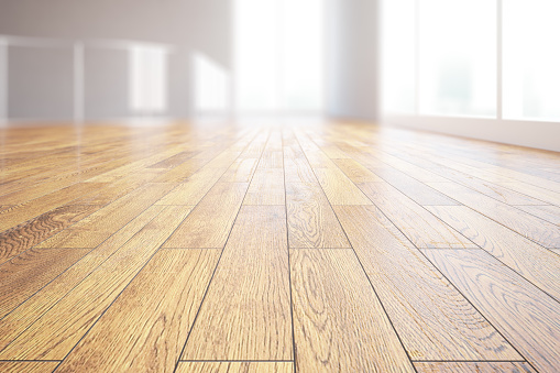 Closeup of light wooden floor in bright room interior. 3D Rendering