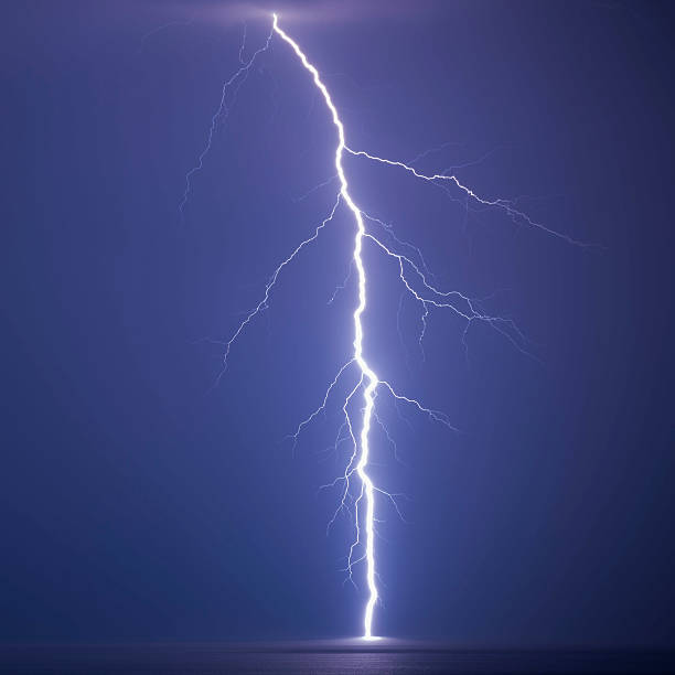 Lightning in sea stock photo