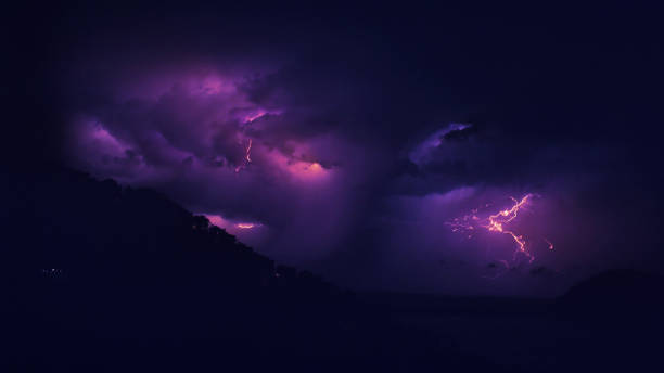 Lightning storm at night. stock photo