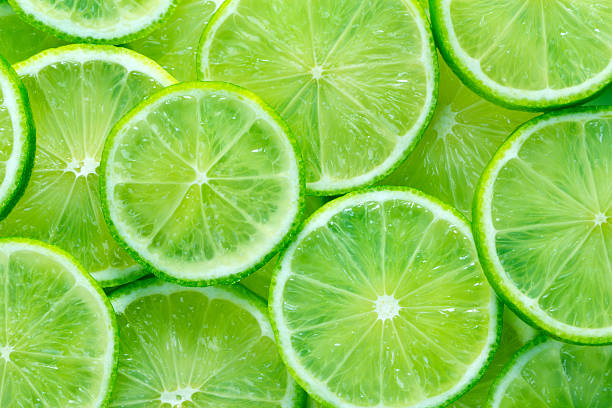 Lime slices background stock photo