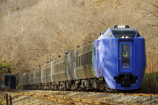 Toyoura-cho, Hokkaido, Japan - November 28, 2018 : KIHA 281 Limited express “Super Hokuto” coming through the tunnel