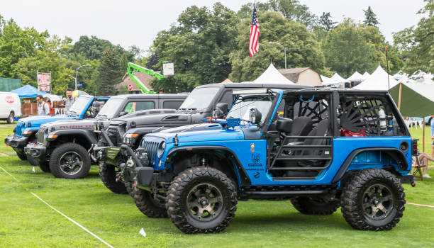 A line of newer Jeep Wranglers on display at the Pittsburgh Vintage Grand Prix, a yearly event for the past 38 years that holds public car shows leading up to the race in Schenley Park stock photo